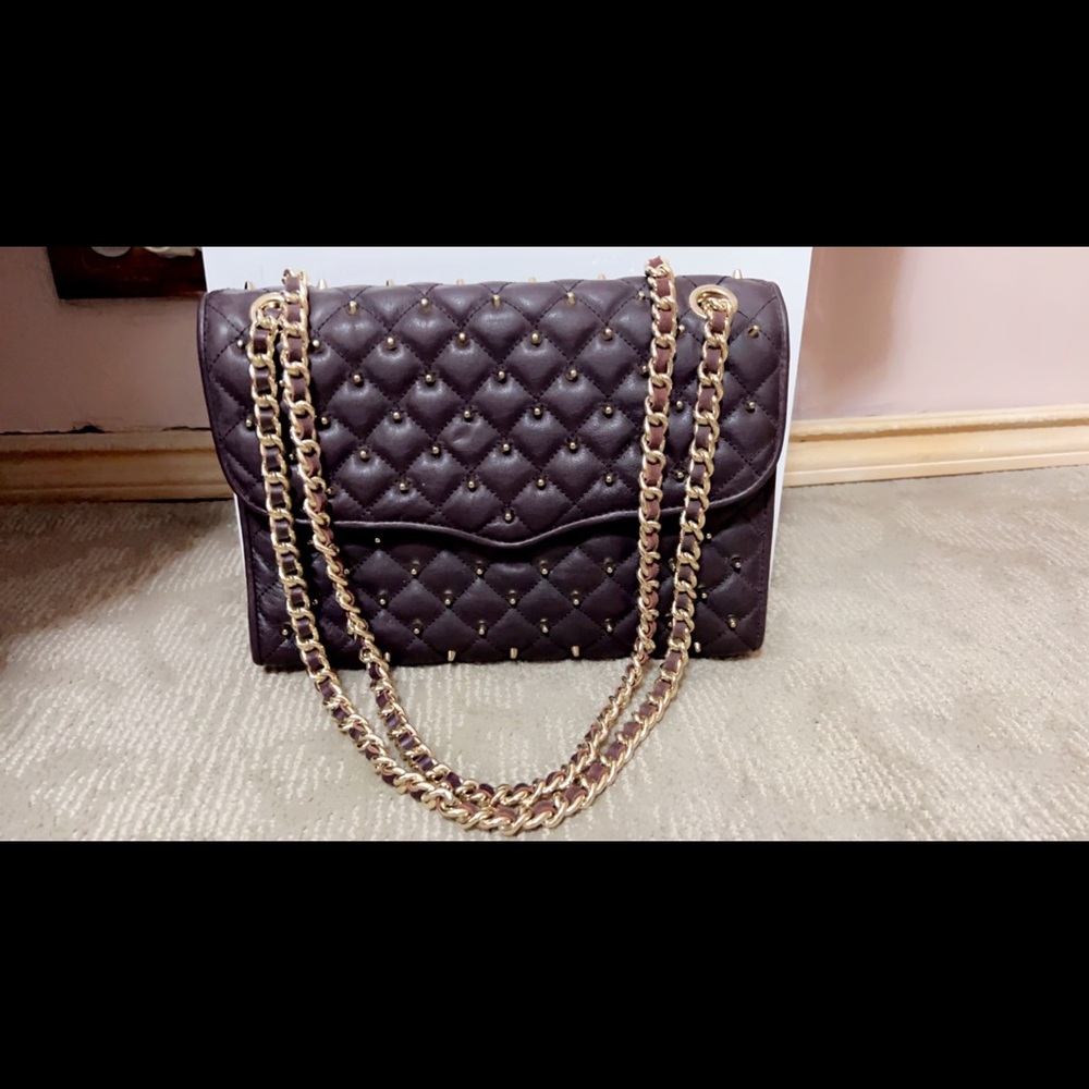 Rebecca Minkoff eggplant color handbag with gold hardware. New and never worn.